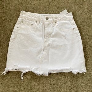Forever 21 white distressed mini jean skirt. Size S.